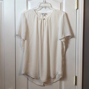 Ladies blouse by Chaus New York in size L.